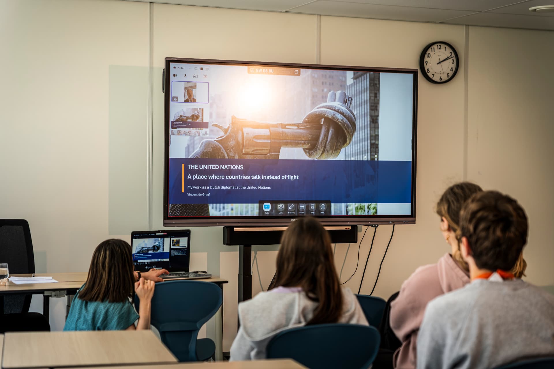 Students listening to a Dutch diplomat speak about the United Nations during a Limitless guest session