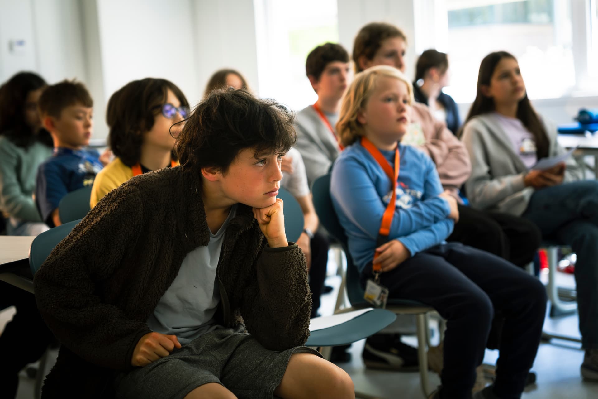 Students listening intently during a Limitless session